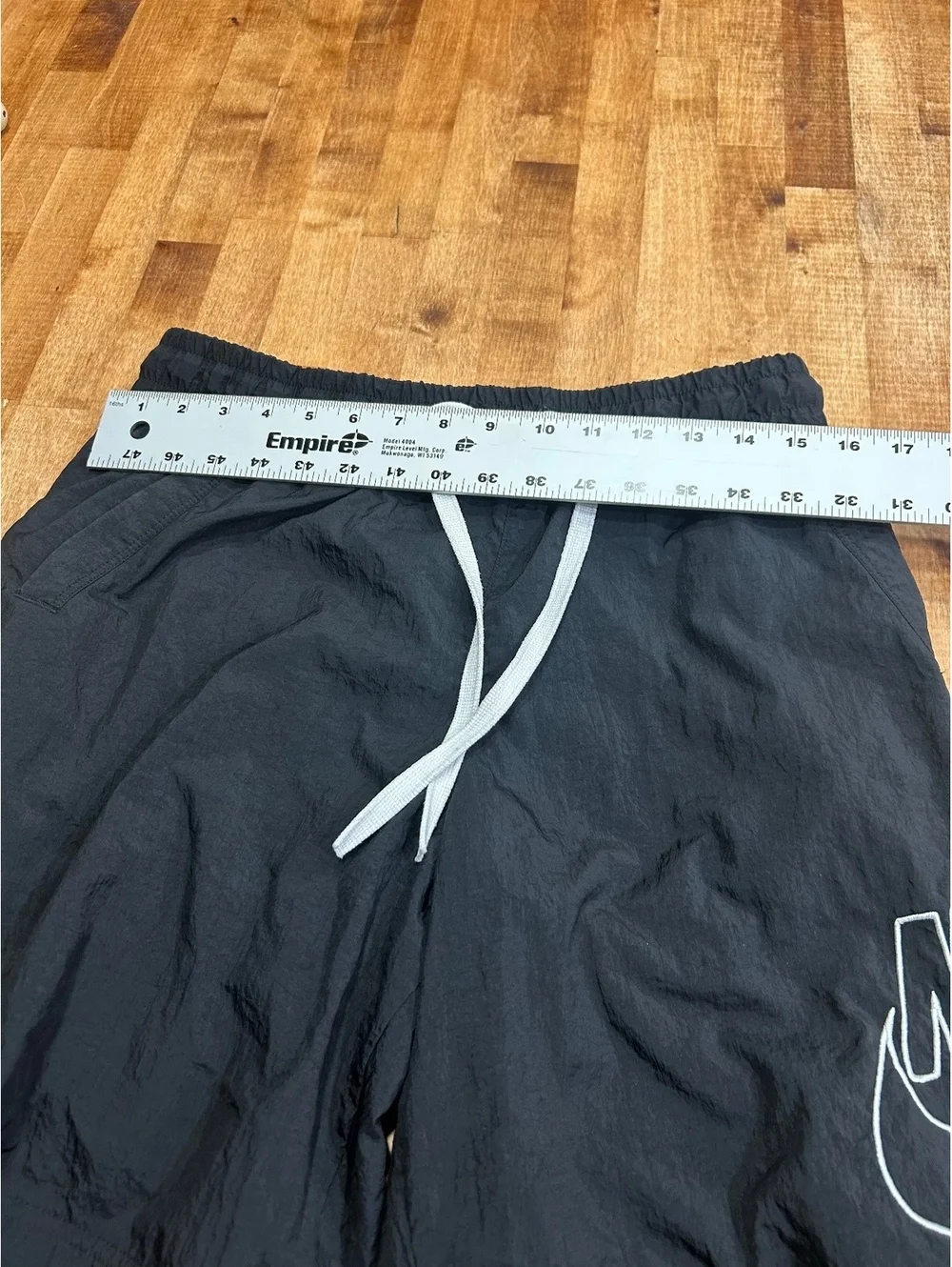 Vintage Nike Men's Black Athletic Shorts with White Drawstring, Size M